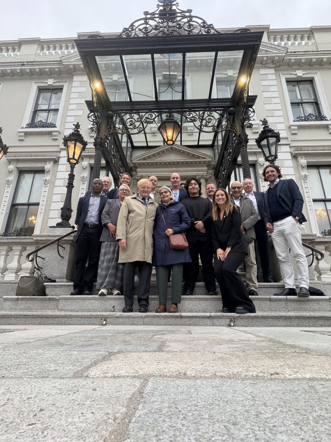 The masterclass group standing on the steps outside the venue